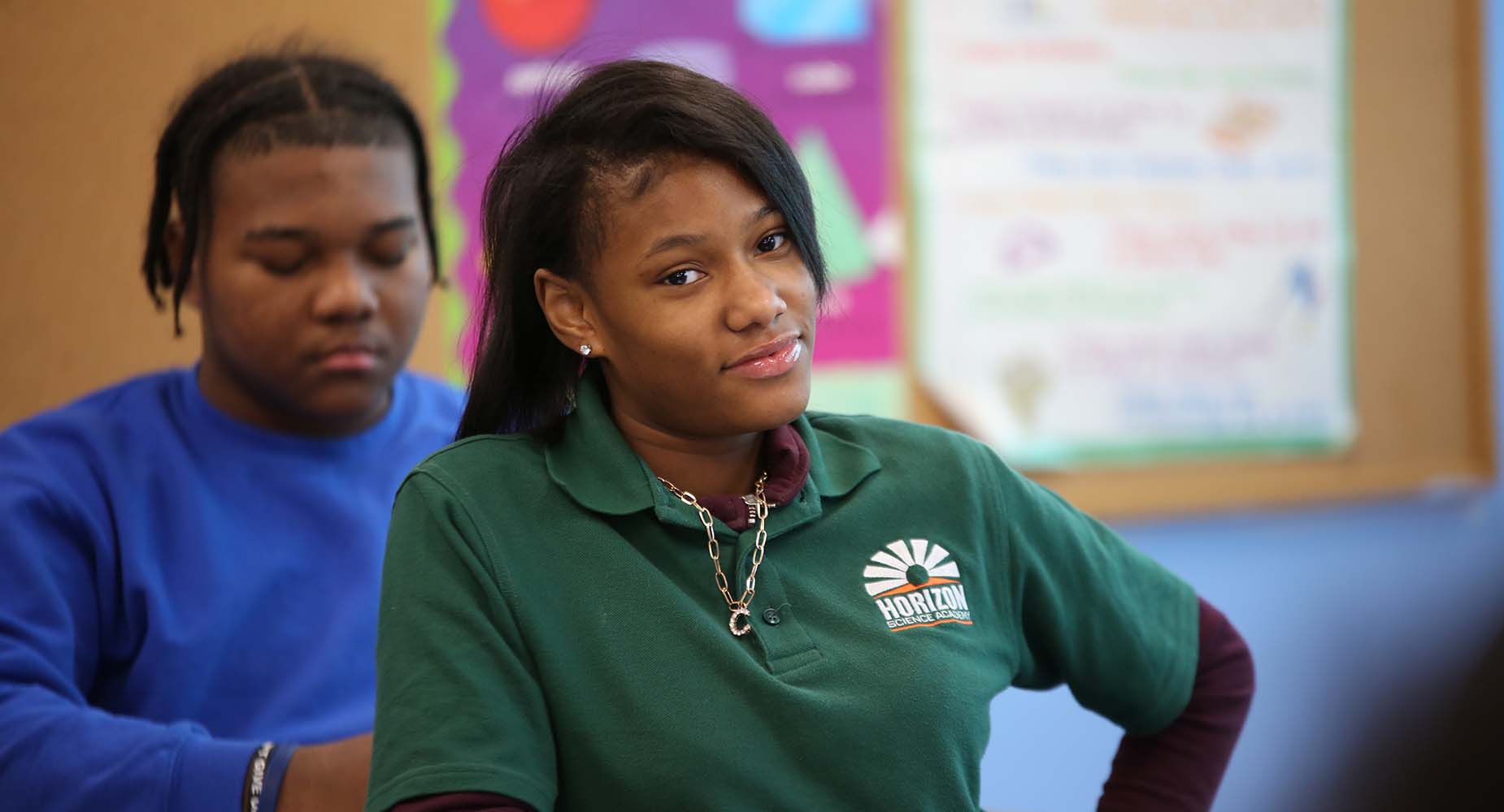 Teacher helping student