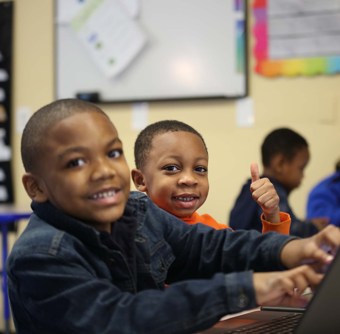 Horizon Science Academy Cleveland Elementary student drawing at a desk in a classroom setting